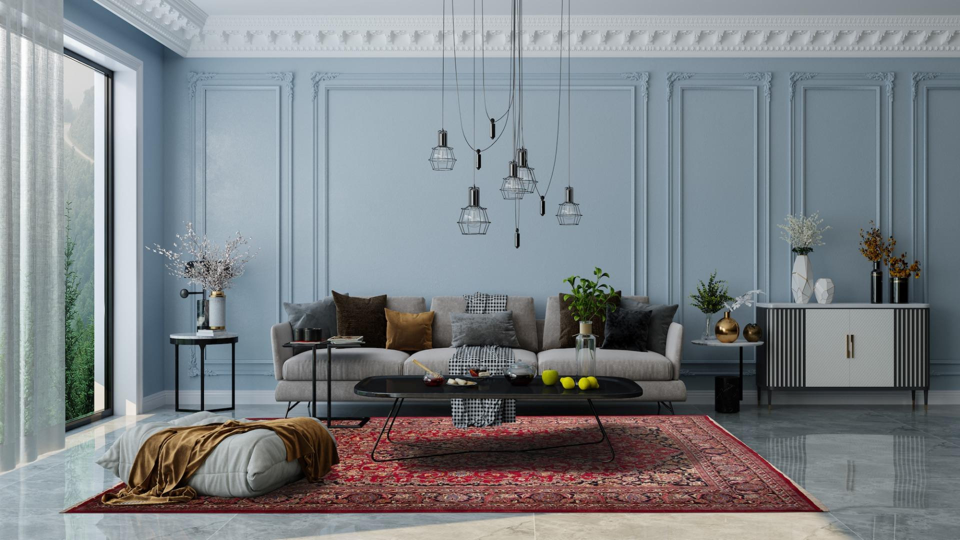 Living albastru-gri cu lambriuri decorative pe pereți și cornișă ornamentată