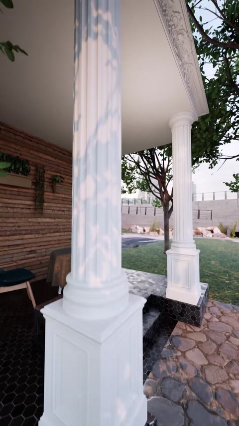 Coloana canelată și baza decorativă sunt văzute din lateral.