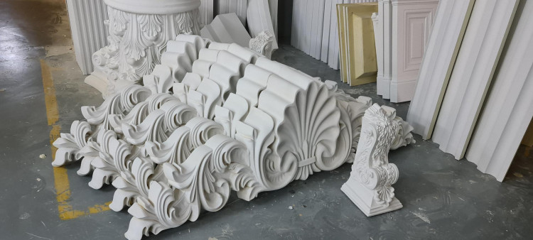 Decorative Polyurethane Crown: Production, Benefits, Applications Polyurethane pole production: Production of the decorative polyurethane crown for the pediment

Polyurethane poles have become increasingly popular in the construction industry due to their versatility, durability, and cost-effectiveness. These poles are commonly used for various applications, such as decorative crowns for pediments. In this article, we will explore the production process of the decorative polyurethane crown for the pediment, highlighting its benefits and applications.

The production of the decorative polyurethane crown for the pediment involves several stages, starting with the design and mold creation. Skilled designers create intricate and detailed designs using computer-aided design (CAD) software. Once the design is finalized, a mold is created using high-quality materials, such as silicone or polyurethane rubber. The mold is carefully crafted to ensure accurate reproduction of the design.

The next step in the production process is the preparation of the polyurethane mixture. Polyurethane is a versatile material that can be molded into various shapes and sizes. It is made by combining two main components - polyol and isocyanate. These components are mixed together in specific ratios to achieve the desired physical properties of the final product. The mixture is then poured into the mold, which is carefully sealed to prevent any leakage.

Once the polyurethane mixture is poured into the mold, it is left to cure. Curing is a crucial step in the production process as it allows the polyurethane to solidify and take the shape of the mold. The curing time can vary depending on the size and complexity of the crown. After the curing process is complete, the mold is opened, and the newly formed polyurethane crown is carefully removed.

The decorative polyurethane crown can now undergo various finishing processes to enhance its appearance and durability. These processes may include sanding, painting, and applying a protective coating. Sanding helps to smooth out any imperfections on the surface of the crown, ensuring a flawless finish. Painting can be done in a wide range of colors, allowing for customization to match the aesthetic requirements of the project. Finally, a protective coating is applied to protect the crown from weathering and UV damage, ensuring its longevity.

The decorative polyurethane crown for the pediment offers numerous benefits over traditional materials such as wood or plaster. Firstly, polyurethane is highly resistant to moisture, rot, and insect damage, making it an ideal choice for exterior applications. It is also lightweight, making it easier to handle and install. Additionally, polyurethane is a cost-effective option as it requires minimal maintenance and has a long lifespan.

The applications of the decorative polyurethane crown are vast. It can be used in various architectural styles, ranging from classic to contemporary. The intricate designs and details add a touch of elegance and grandeur to any building facade. The crown can be installed on pediments, archways, or any other architectural feature that requires a decorative element. It is a versatile product that can be customized to suit individual project requirements.

In conclusion, the production of the decorative polyurethane crown for the pediment involves a meticulous process from design to finishing. The use of polyurethane offers numerous benefits, including durability, versatility, and cost-effectiveness. Its applications are vast, making it a popular choice among architects and builders. With its ability to replicate intricate designs and withstand harsh weather conditions, the decorative polyurethane crown is a perfect addition to any architectural project.